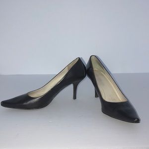 Used brown pumps